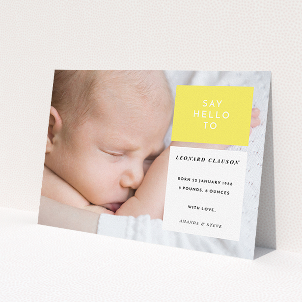 A new baby announcement card template titled 'Two Frames'. It is an A5 card in a landscape orientation. It is a photographic new baby announcement card with room for 1 photo. 'Two Frames' is available as a flat card, with tones of yellow and white.
