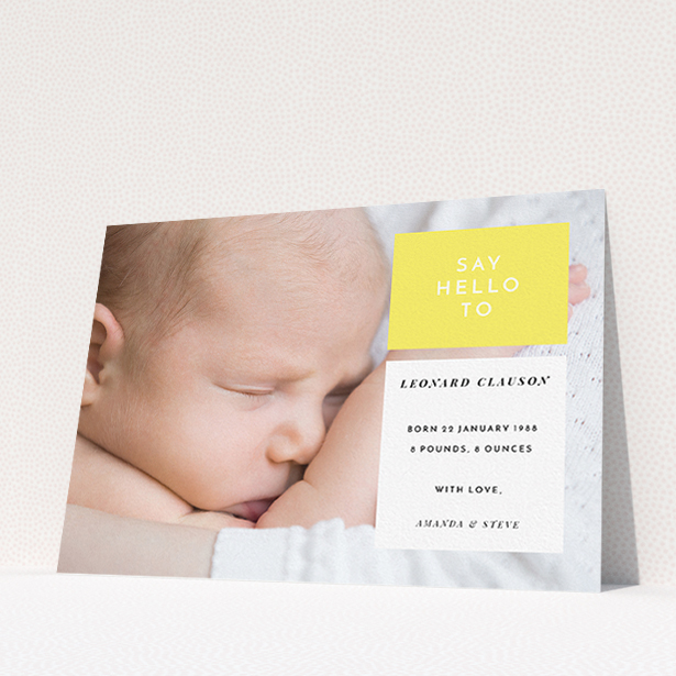 A new baby announcement card template titled "Two Frames". It is an A5 card in a landscape orientation. It is a photographic new baby announcement card with room for 1 photo. "Two Frames" is available as a flat card, with tones of yellow and white.