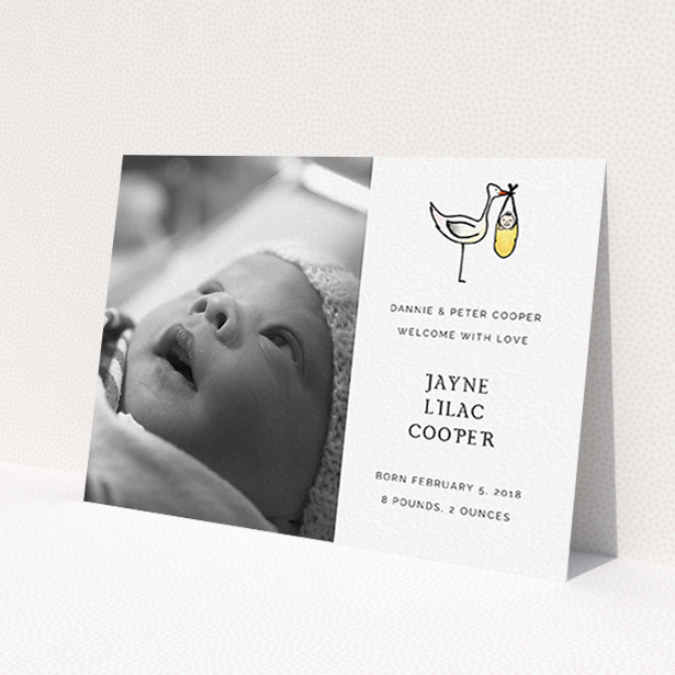 A new baby announcement card template titled 'Watercolour Stork'. It is an A6 card in a landscape orientation. It is a photographic new baby announcement card with room for 1 photo. 'Watercolour Stork' is available as a flat card, with tones of black and white.