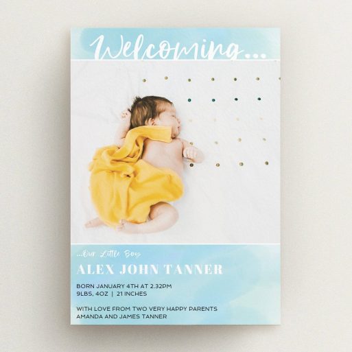 A new baby announcement card called "Watercolour Welcome". It is an A5 card in a portrait orientation. It is a photographic new baby announcement card with room for 1 photo. "Watercolour Welcome" is available as a flat card, with tones of blue and white.