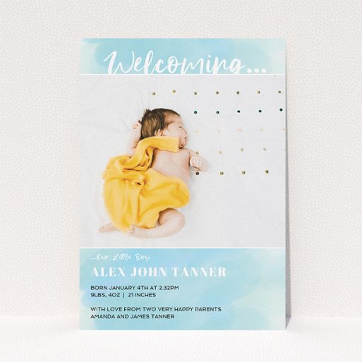 A new baby announcement card called "Watercolour Welcome". It is an A5 card in a portrait orientation. It is a photographic new baby announcement card with room for 1 photo. "Watercolour Welcome" is available as a flat card, with tones of blue and white.