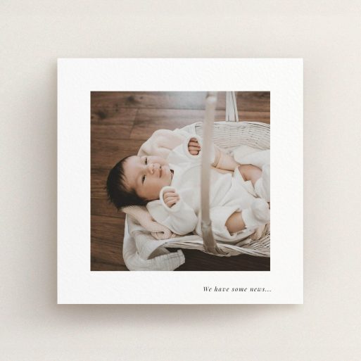 A new baby announcement card called "We have some news". It is a square (148mm x 148mm) card in a square orientation. It is a photographic new baby announcement card with room for 1 photo. "We have some news" is available as a flat card, with mainly white colouring.
