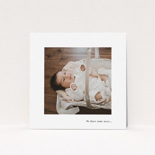 A new baby announcement card called "We have some news". It is a square (148mm x 148mm) card in a square orientation. It is a photographic new baby announcement card with room for 1 photo. "We have some news" is available as a flat card, with mainly white colouring.
