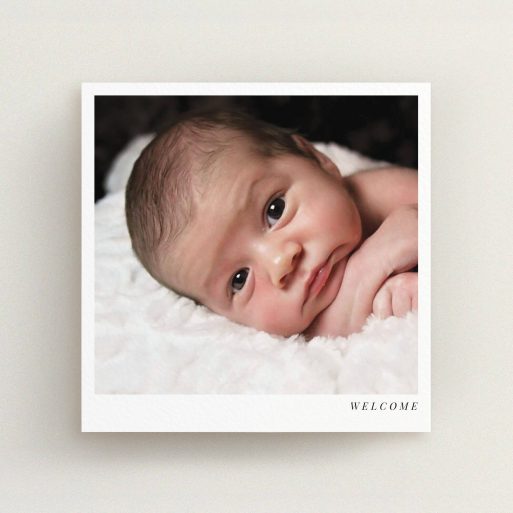A new baby announcement card named "Welcome". It is a square (148mm x 148mm) card in a square orientation. It is a photographic new baby announcement card with room for 1 photo. "Welcome" is available as a flat card, with mainly white colouring.