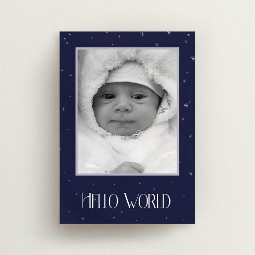 A new baby announcement card named "Written in the Stars". It is an A6 card in a portrait orientation. It is a photographic new baby announcement card with room for 1 photo. "Written in the Stars" is available as a flat card, with tones of navy blue and white.