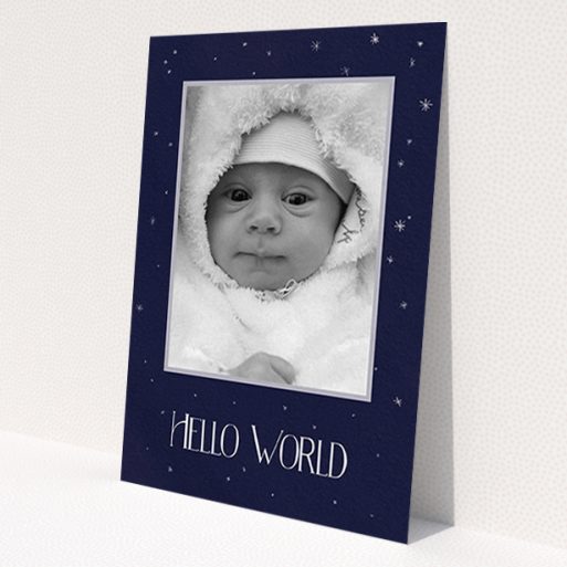 A new baby announcement card named 'Written in the Stars'. It is an A6 card in a portrait orientation. It is a photographic new baby announcement card with room for 1 photo. 'Written in the Stars' is available as a flat card, with tones of navy blue and white.