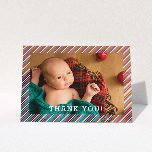 A new baby thank you card design titled "Blue, Red and White Slant". It is an A5 card in a landscape orientation. It is a photographic new baby thank you card with room for 1 photo. "Blue, Red and White Slant" is available as a folded card, with mainly red colouring.