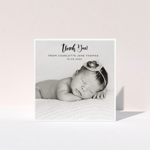 A new baby thank you card named "Bordered Photo Square". It is a square (148mm x 148mm) card in a square orientation. It is a photographic new baby thank you card with room for 1 photo. "Bordered Photo Square" is available as a folded card, with mainly white colouring.