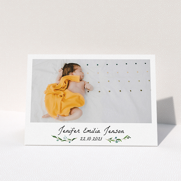 A new baby thank you card design named "Classic Floral". It is an A5 card in a landscape orientation. It is a photographic new baby thank you card with room for 1 photo. "Classic Floral" is available as a folded card, with tones of black and white.