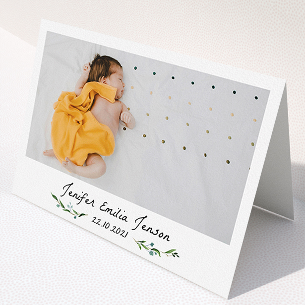 A new baby thank you card design named "Classic Floral". It is an A5 card in a landscape orientation. It is a photographic new baby thank you card with room for 1 photo. "Classic Floral" is available as a folded card, with tones of black and white.