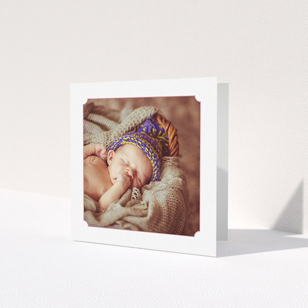 A new baby thank you card called 'Classic Frame'. It is a square (148mm x 148mm) card in a square orientation. It is a photographic new baby thank you card with room for 1 photo. 'Classic Frame' is available as a folded card, with tones of white and pink.