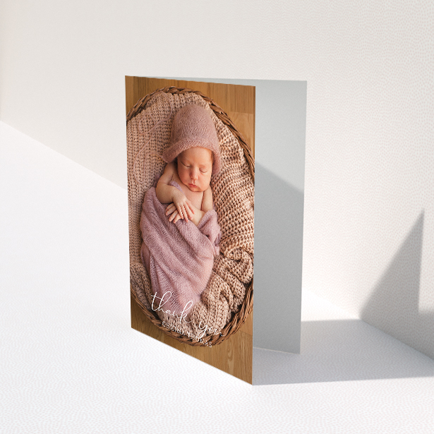 A new baby thank you card named "Classic Thank You". It is an A5 card in a portrait orientation. It is a photographic new baby thank you card with room for 1 photo. "Classic Thank You" is available as a folded card, with mainly white colouring.