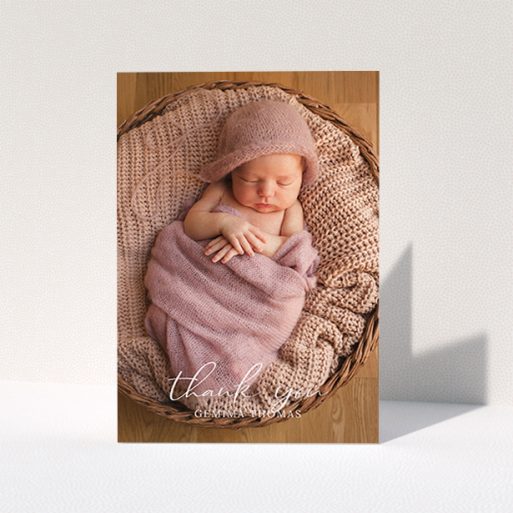 A new baby thank you card design named "Classic Thank You". It is an A6 card in a portrait orientation. It is a photographic new baby thank you card with room for 1 photo. "Classic Thank You" is available as a folded card, with mainly white colouring.