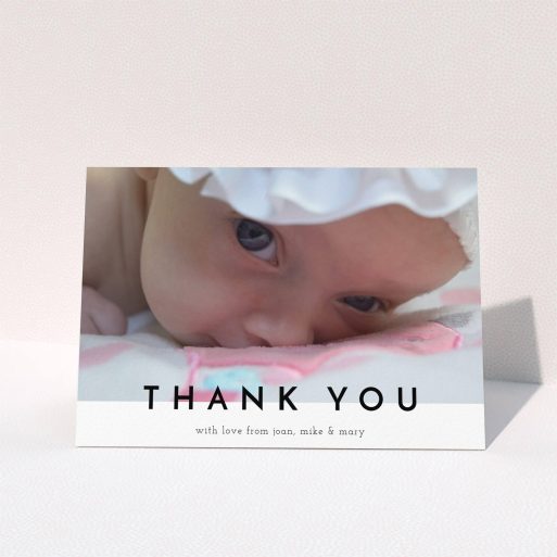A new baby thank you card named "Cross Border". It is an A6 card in a landscape orientation. It is a photographic new baby thank you card with room for 1 photo. "Cross Border" is available as a folded card, with mainly white colouring.