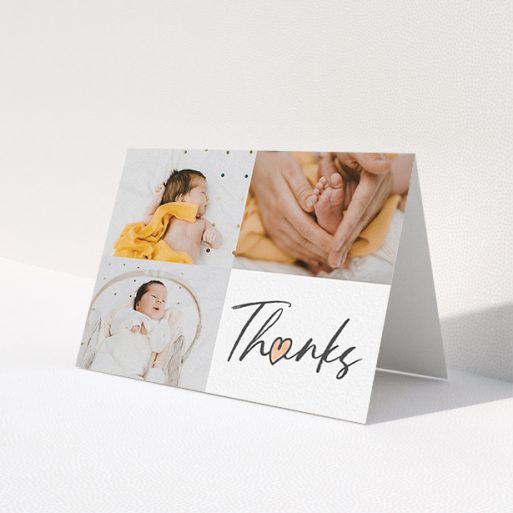 A new baby thank you card named 'Handwritten Heart'. It is an A6 card in a landscape orientation. It is a photographic new baby thank you card with room for 3 photos. 'Handwritten Heart' is available as a folded card, with tones of black and white.
