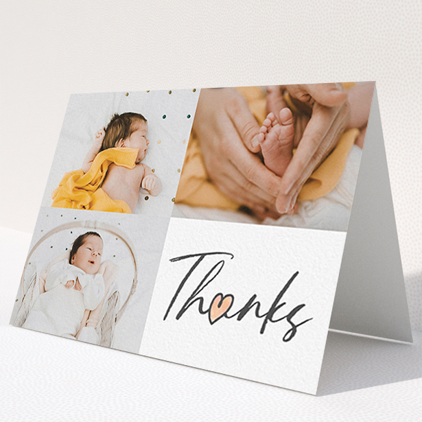 A new baby thank you card named "Handwritten Heart". It is an A6 card in a landscape orientation. It is a photographic new baby thank you card with room for 3 photos. "Handwritten Heart" is available as a folded card, with tones of black and white.