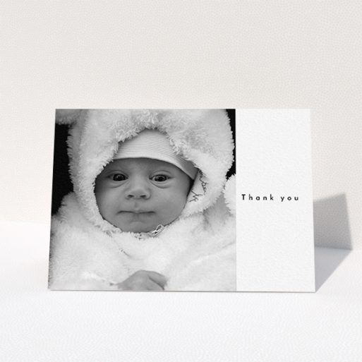 A new baby thank you card template titled "Most of the Page Frame". It is an A6 card in a landscape orientation. It is a photographic new baby thank you card with room for 1 photo. "Most of the Page Frame" is available as a folded card, with mainly white colouring.