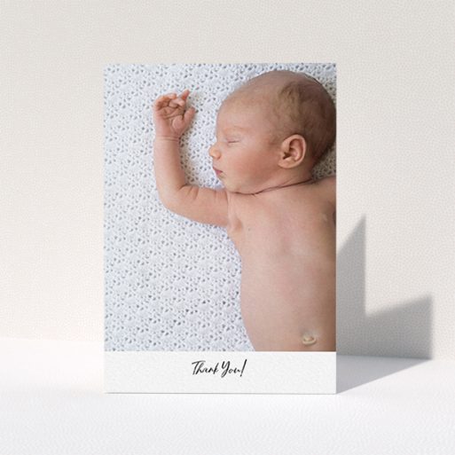 A new baby thank you card named "Mr & Mrs Footer". It is an A6 card in a portrait orientation. It is a photographic new baby thank you card with room for 1 photo. "Mr & Mrs Footer" is available as a folded card, with mainly white colouring.