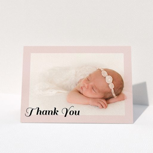 A new baby thank you card named "Pastel Diagonals". It is an A6 card in a landscape orientation. It is a photographic new baby thank you card with room for 1 photo. "Pastel Diagonals" is available as a folded card, with tones of pink and white.