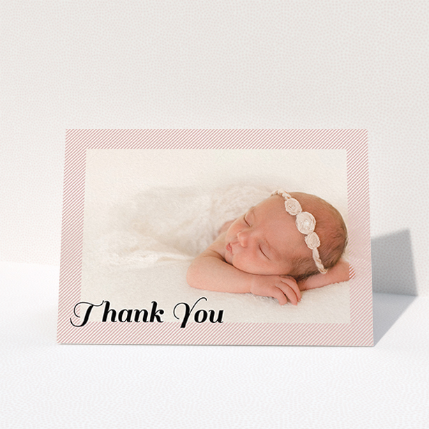 A new baby thank you card named "Pastel Diagonals". It is an A6 card in a landscape orientation. It is a photographic new baby thank you card with room for 1 photo. "Pastel Diagonals" is available as a folded card, with tones of pink and white.