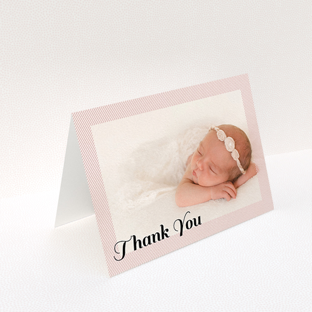 A new baby thank you card named "Pastel Diagonals". It is an A6 card in a landscape orientation. It is a photographic new baby thank you card with room for 1 photo. "Pastel Diagonals" is available as a folded card, with tones of pink and white.