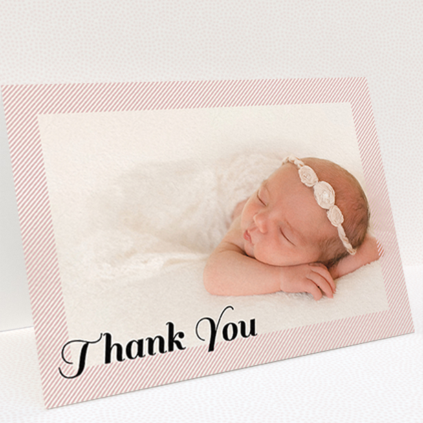 A new baby thank you card named "Pastel Diagonals". It is an A6 card in a landscape orientation. It is a photographic new baby thank you card with room for 1 photo. "Pastel Diagonals" is available as a folded card, with tones of pink and white.