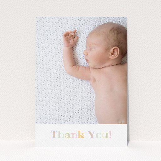 A new baby thank you card design named "Pastel Thank You". It is an A5 card in a portrait orientation. It is a photographic new baby thank you card with room for 1 photo. "Pastel Thank You" is available as a flat card, with tones of white and green.