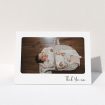 A new baby thank you card template titled "Rounded Thanks". It is an A5 card in a landscape orientation. It is a photographic new baby thank you card with room for 1 photo. "Rounded Thanks" is available as a folded card, with mainly white colouring.