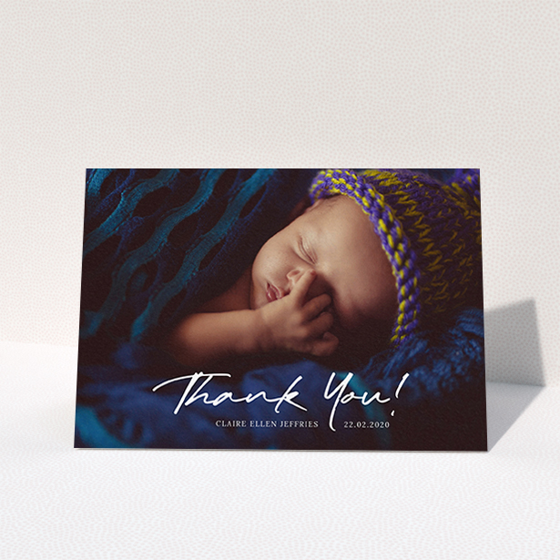 A new baby thank you card design titled "Simple Appreciation". It is an A6 card in a landscape orientation. It is a photographic new baby thank you card with room for 1 photo. "Simple Appreciation" is available as a folded card, with mainly white colouring.