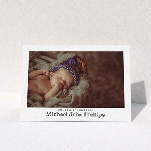 A new baby thank you card design called "Simple Photo Frame". It is an A6 card in a landscape orientation. It is a photographic new baby thank you card with room for 1 photo. "Simple Photo Frame" is available as a folded card, with mainly white colouring.