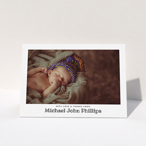 A new baby thank you card design called "Simple Photo Frame". It is an A6 card in a landscape orientation. It is a photographic new baby thank you card with room for 1 photo. "Simple Photo Frame" is available as a folded card, with mainly white colouring.