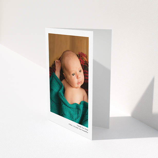A new baby thank you card design named "Simple Portrait". It is an A6 card in a portrait orientation. It is a photographic new baby thank you card with room for 1 photo. "Simple Portrait" is available as a folded card, with mainly white colouring.
