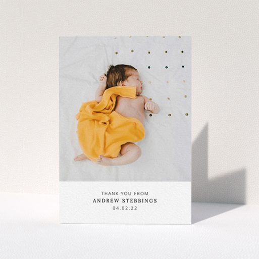 A new baby thank you card named "Simple, Portrait Thank You". It is an A6 card in a portrait orientation. It is a photographic new baby thank you card with room for 1 photo. "Simple, Portrait Thank You" is available as a folded card, with mainly white colouring.