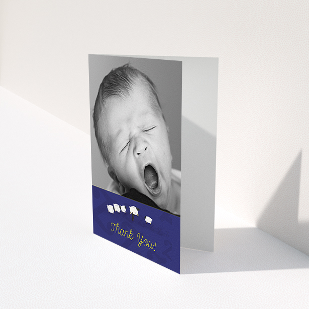 A new baby thank you card called "Sleepy Time". It is an A6 card in a portrait orientation. It is a photographic new baby thank you card with room for 1 photo. "Sleepy Time" is available as a folded card, with tones of navy blue and white.