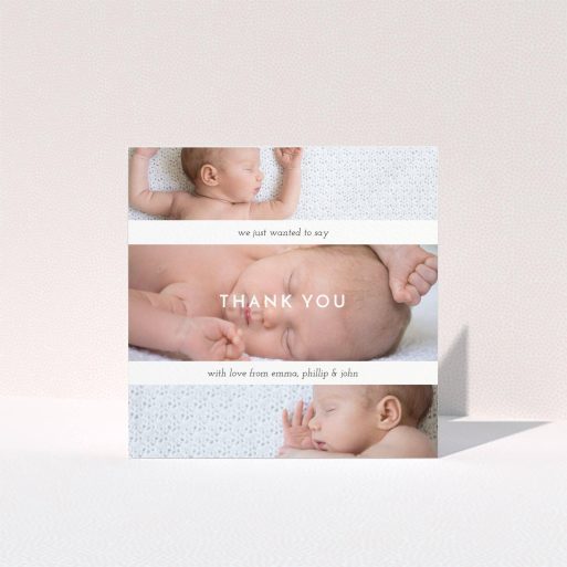 A new baby thank you card named "Stacked Frames". It is a square (148mm x 148mm) card in a square orientation. It is a photographic new baby thank you card with room for 3 photos. "Stacked Frames" is available as a folded card, with mainly white colouring.