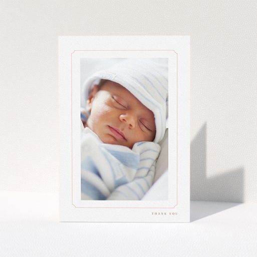 A new baby thank you card design titled "Thin Pink". It is an A5 card in a portrait orientation. It is a photographic new baby thank you card with room for 1 photo. "Thin Pink" is available as a folded card, with tones of white and pink.
