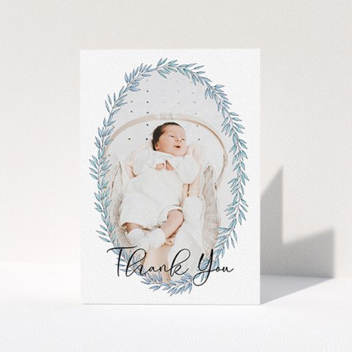 A new baby thank you card called "Tussled Wreath". It is an A6 card in a portrait orientation. It is a photographic new baby thank you card with room for 1 photo. "Tussled Wreath" is available as a folded card, with tones of blue and white.