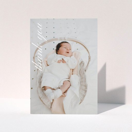 A new baby thank you card design called "Up the Side". It is an A5 card in a portrait orientation. It is a photographic new baby thank you card with room for 1 photo. "Up the Side" is available as a folded card, with mainly white colouring.
