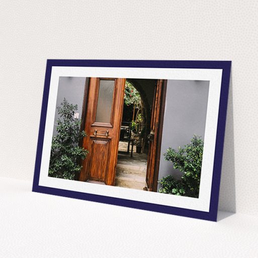 A new home card design named 'Navy Border'. It is an A6 card in a landscape orientation. It is a photographic new home card with room for 1 photo. 'Navy Border' is available as a flat card, with tones of navy blue and white.