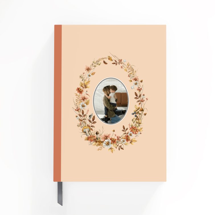 Floral design portrait notebook cover with one photo placeholder.