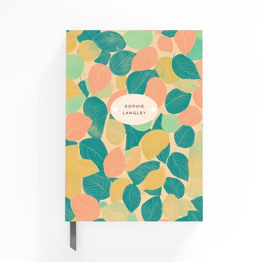 Colourful leaf-patterned notebook design with one photo placeholder and personalised name by Utterly Printable.