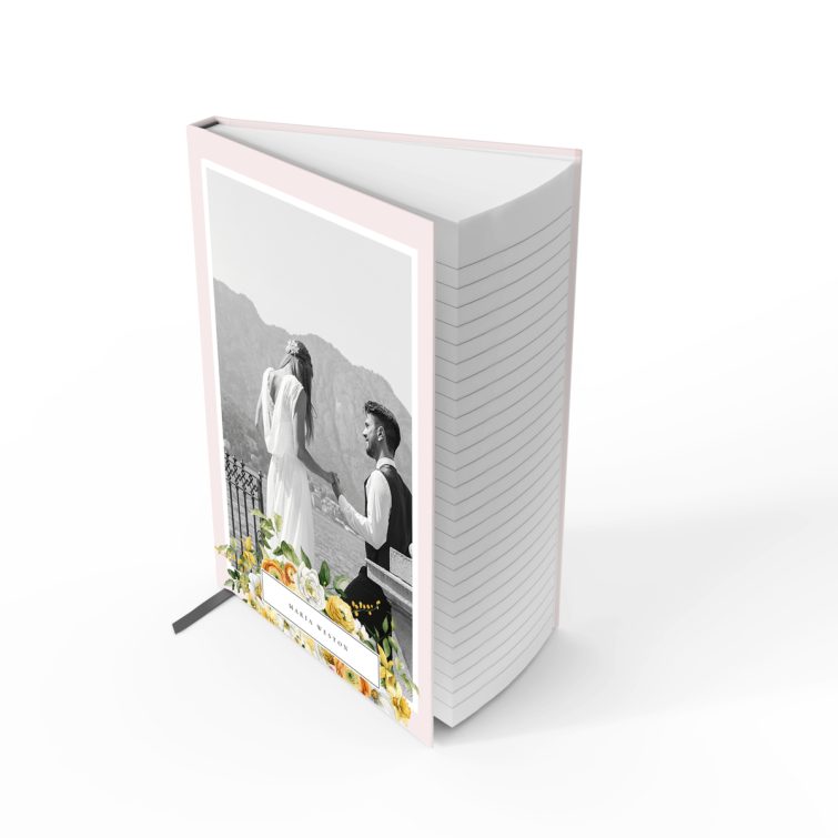 Floral wedding notebook design with one black and white photo on the cover, featuring a pastel pink background.