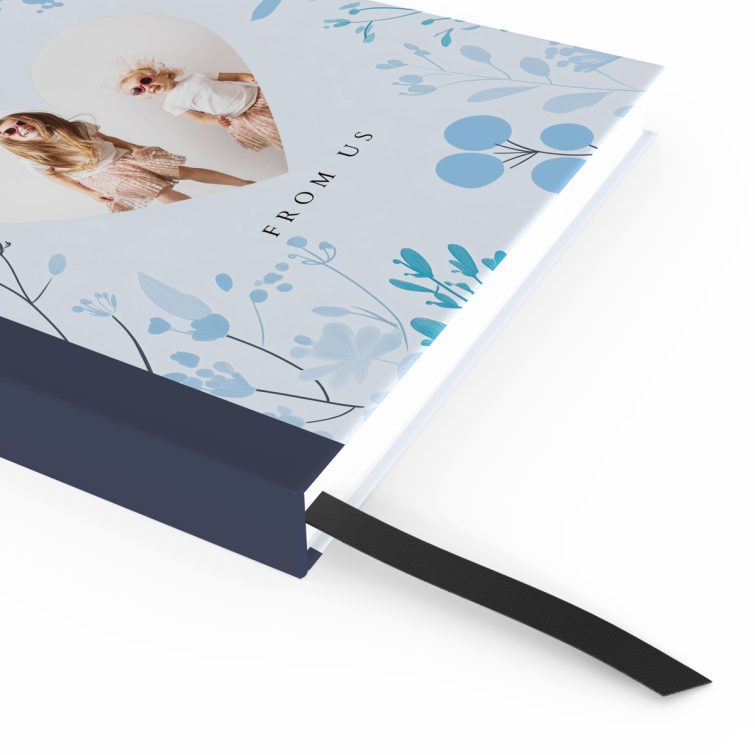 Personalised portrait notebook cover design with floral patterns and one heart-shaped photo slot.