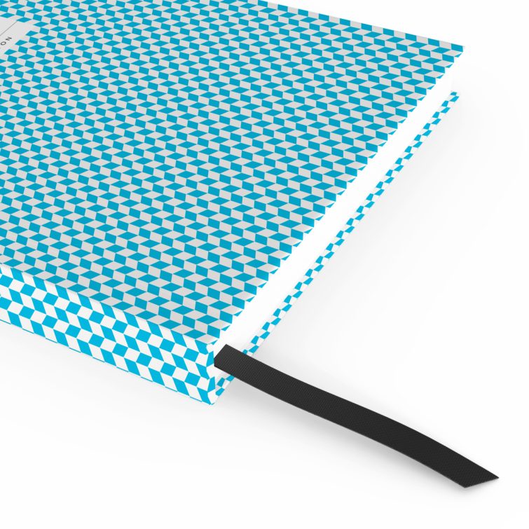 Blue geometric pattern notebook cover design with one photo placeholder from Utterly Printable.