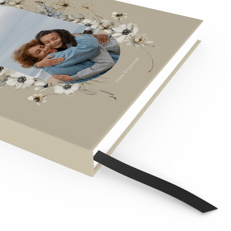 Floral design portrait notebook with one photo on the front cover.