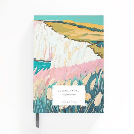 Colourful landscape design hardcover notebook with coastal scenery and two lighthouses.