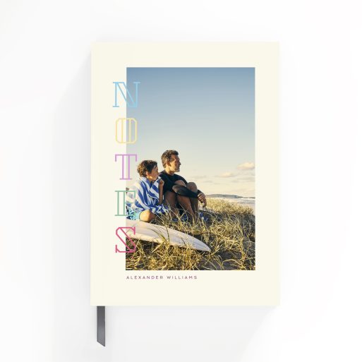 Portrait orientation notebook design with one cover photo and colourful text.