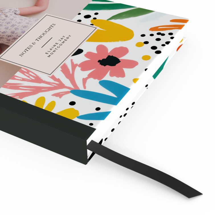 Floral notebook design with colourful flowers, featuring one photo on the back cover, ideal for personalisation by Utterly Printable.