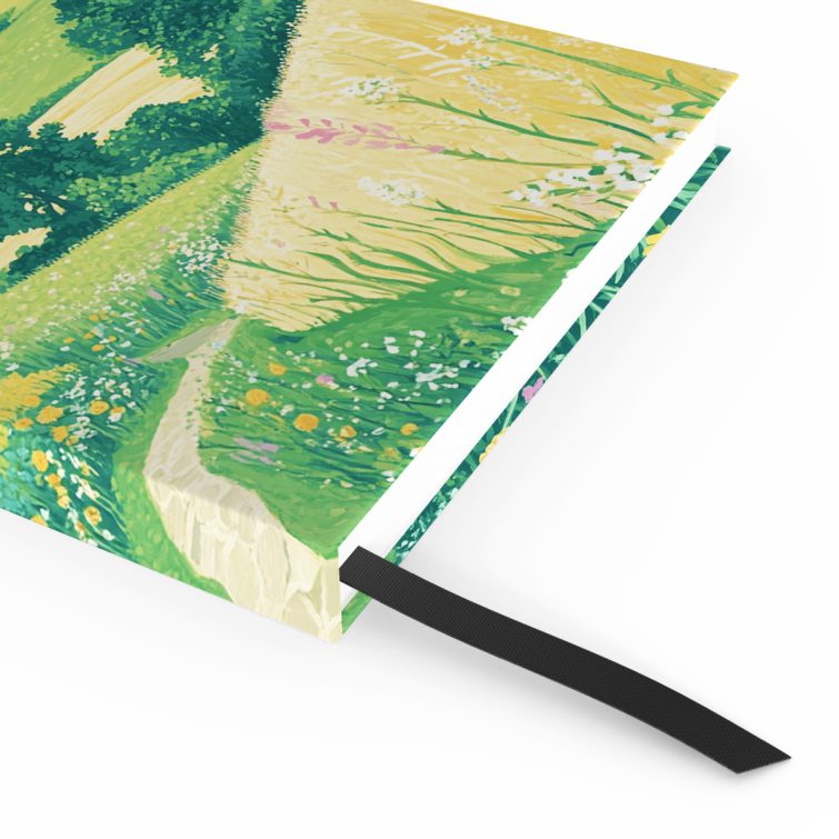 Colourful countryside landscape design on notebook cover with floral patterns, ideal for personalised gifts; includes one image.