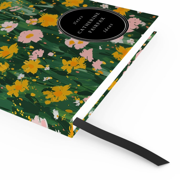 Floral design notebook cover with vibrant pink and yellow flowers on a green background, featuring one photo placeholder.